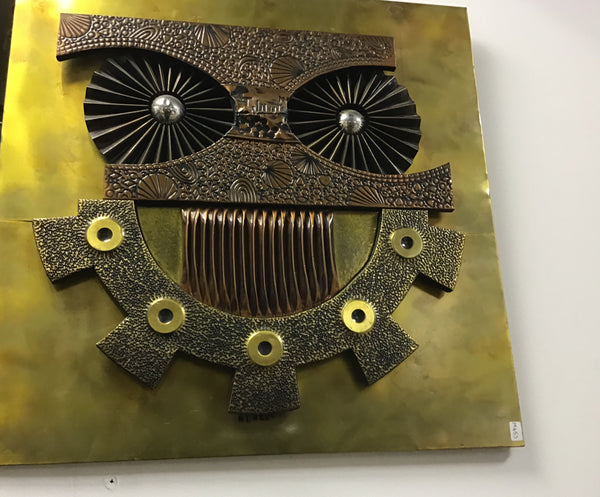 A COPPER AND BRASS SHEET OWL SCULPTURAL WALL PANEL 1970S