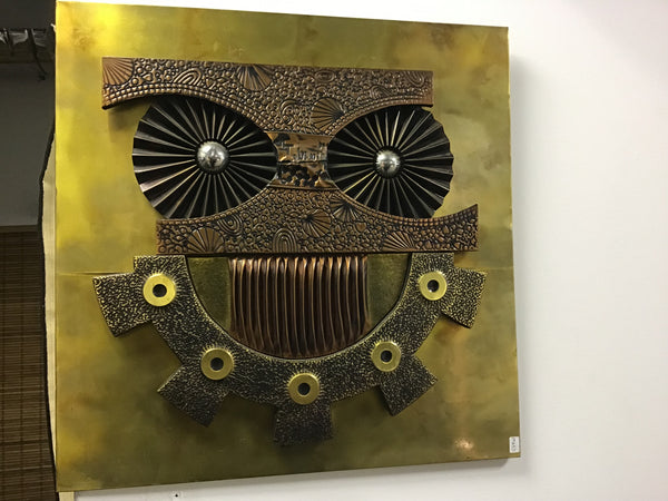 A COPPER AND BRASS SHEET OWL SCULPTURAL WALL PANEL 1970S